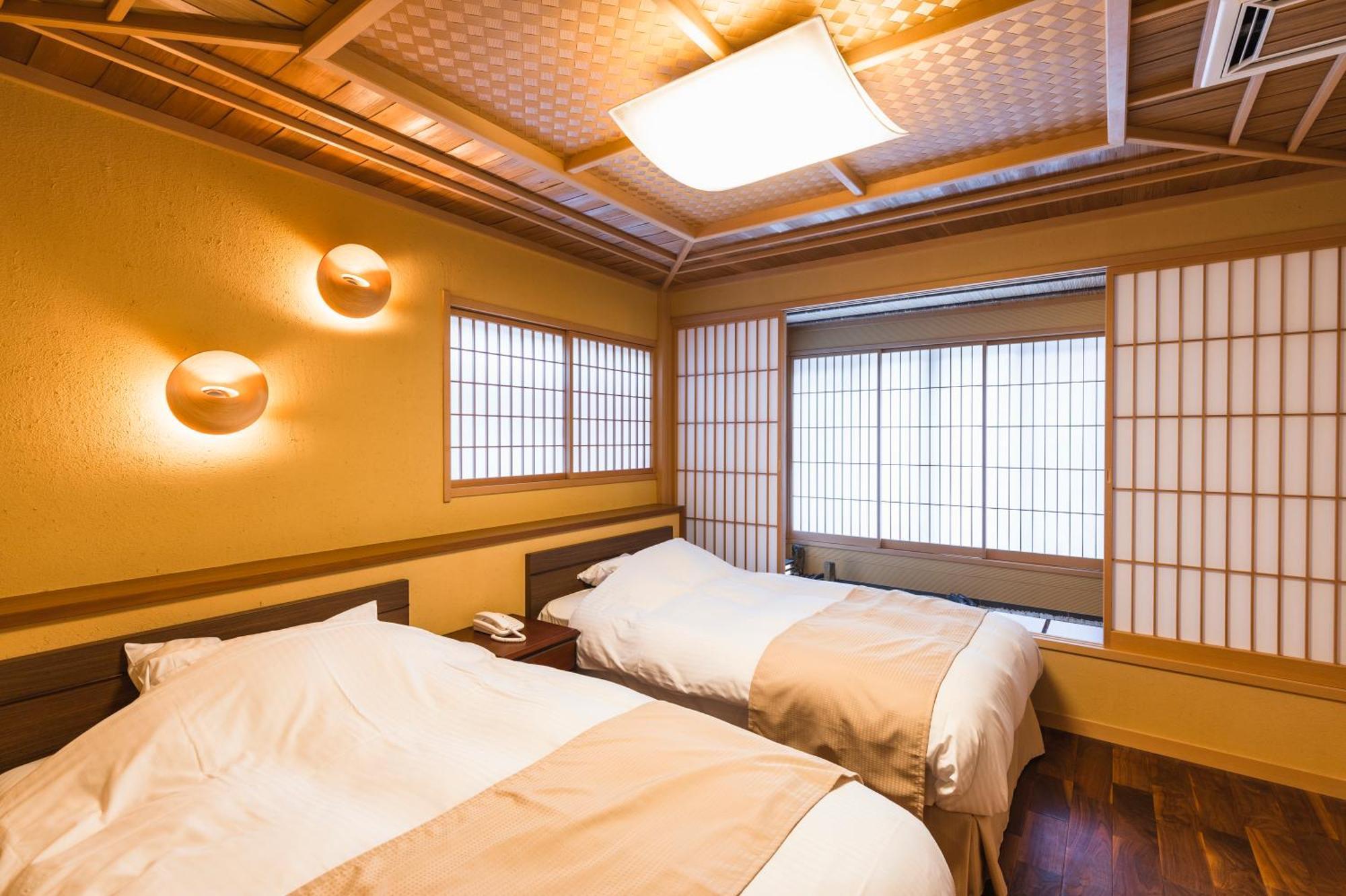 Tsuta Onsen Ryokan Товада Номер фото