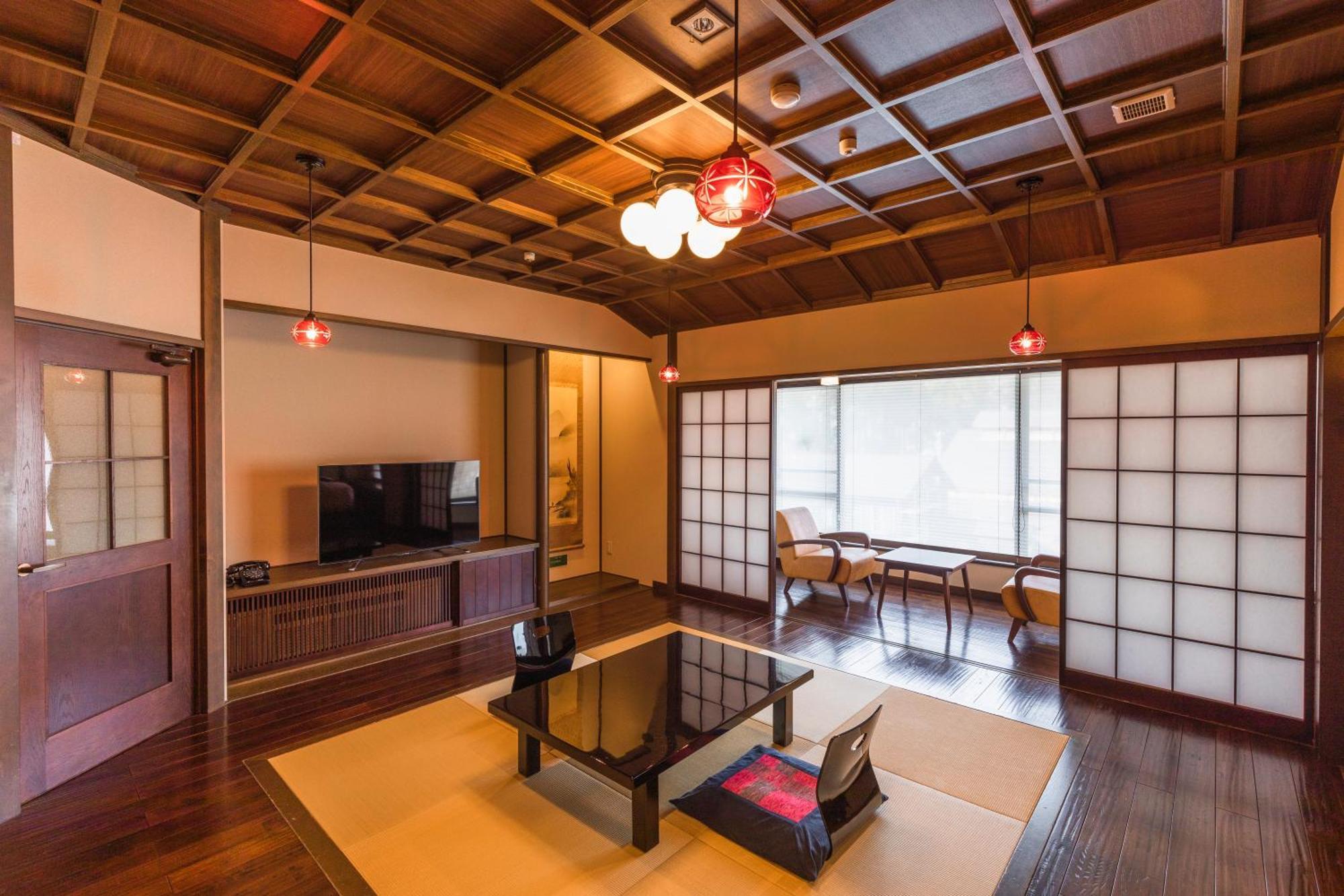 Tsuta Onsen Ryokan Товада Номер фото
