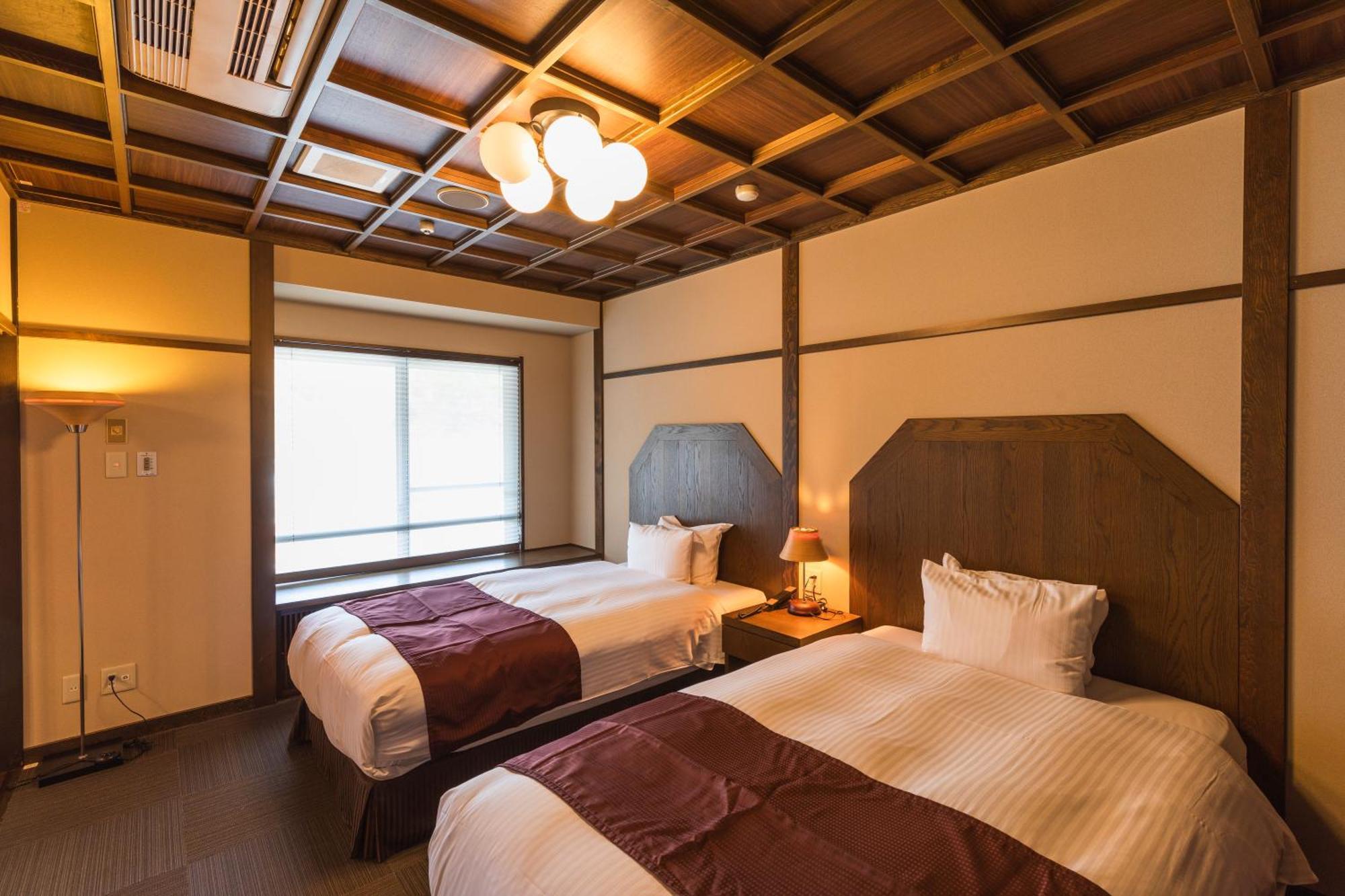 Tsuta Onsen Ryokan Товада Номер фото
