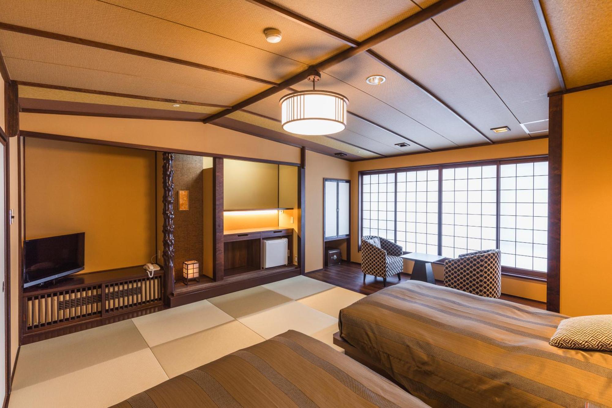 Tsuta Onsen Ryokan Товада Номер фото